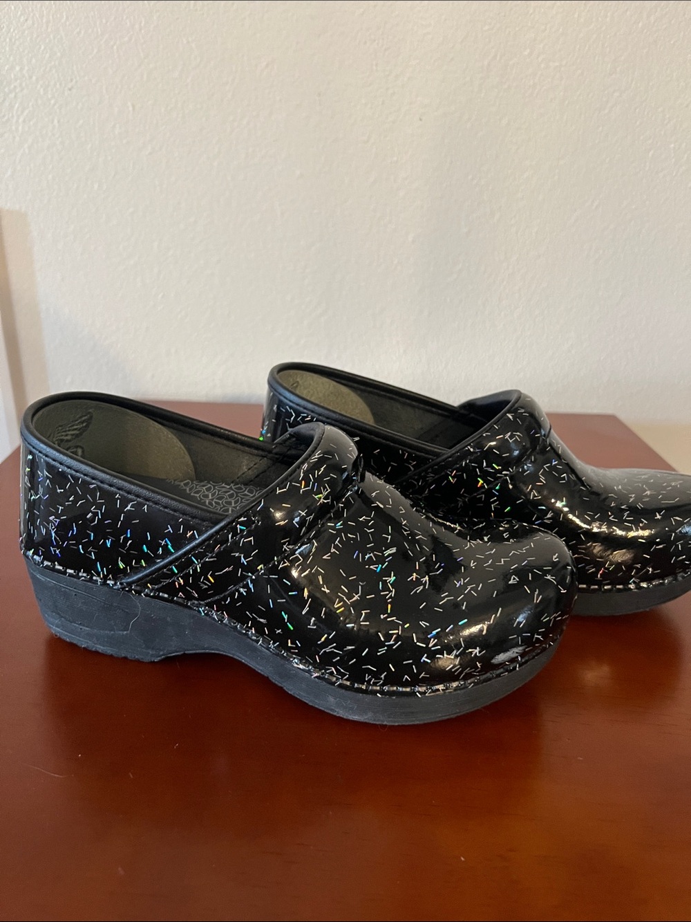 Dansko Confetti holographic patent black clogs size 35